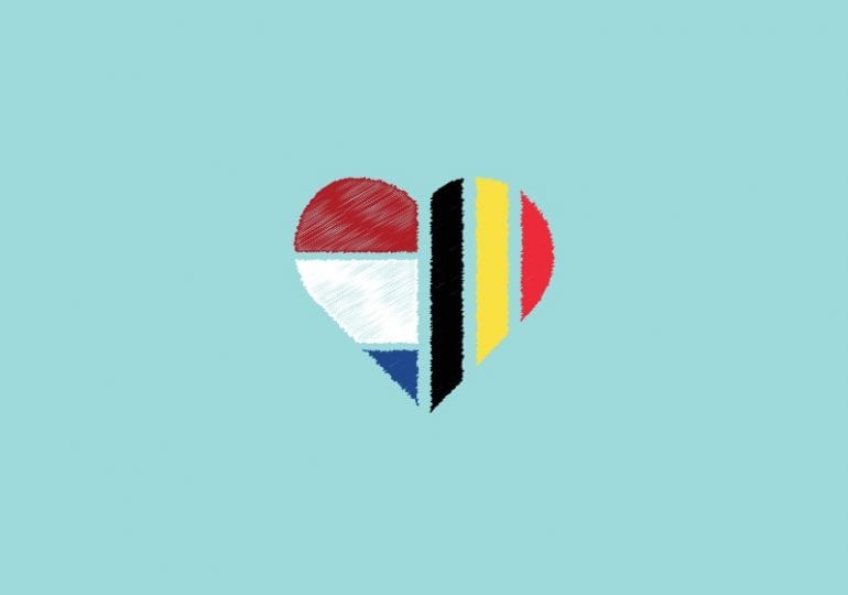 Hart met de ene helft een getekende Nederlandse vlag, andere helft getekende Belgische vlag.